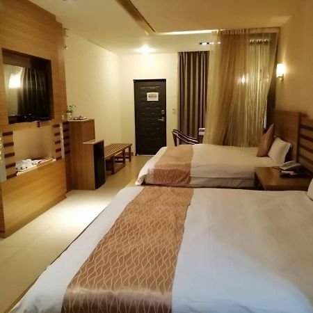 Nikaido Business Hotel Minxiong Esterno foto